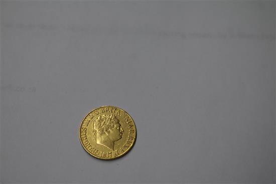 A George III gold sovereign, 1817, edge nick otherwise F.